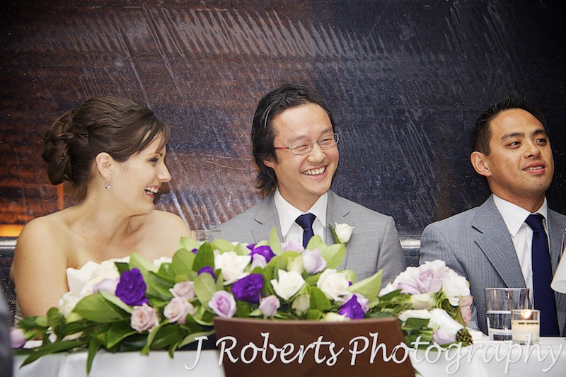 Groom laughing at speeches - wedding photography sydney
